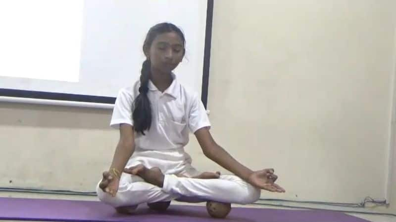 private school student at namakkal did a yoga at coconut