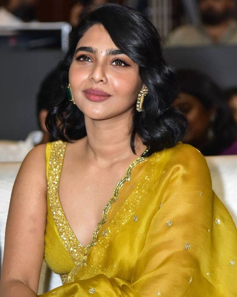 Aishwarya lekshmi looks dazzling in King of Kotha pre release event