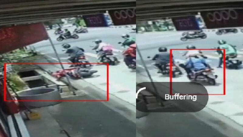 A woman fell into the drain when she hit the brakes while driving the scooty in Video goes viral akb