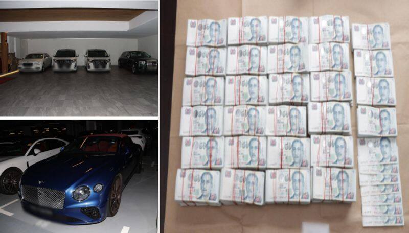 totally 10 foreign nationals arrested in Singapore under money laundering act cars and many thigs seized 