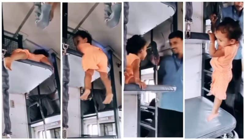 video of the baby climbs down from upper to lower berth went viral bkg