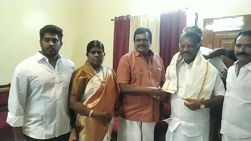 former cm o panneerselvam met dmk district secretary thanga tamilselvan at theni