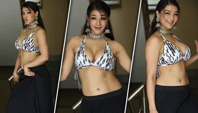 Namrata Malla HOT Photos: Bhojpuri actress flaunts her cleavage in BOLD black and white striped bikini vma