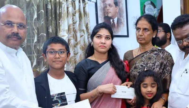 Telangana Minister  Sabitha Indra Reddy  Gives   1 crore  Rupees To Saichand Wife  Rajini