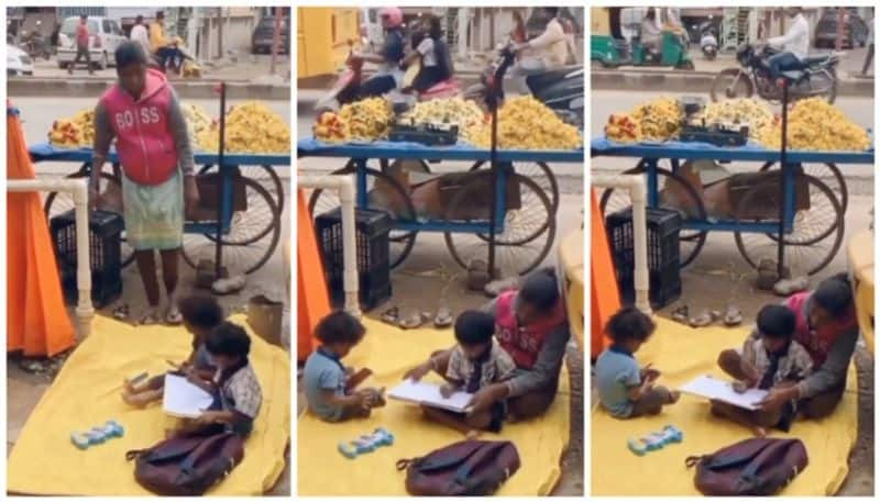 video of the  Fruit Seller mother teaching her children Near Roadside Stall goes viral bkg 