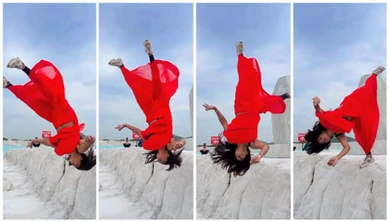 video of Young woman doing a somersault by wearing a sari went viral bkg 