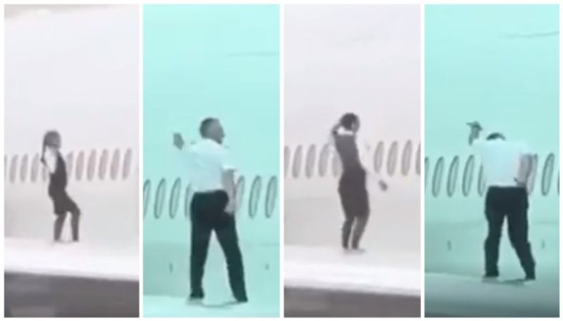 video of the cabin crew dancing on the wing of the plane has gone viral bkg 