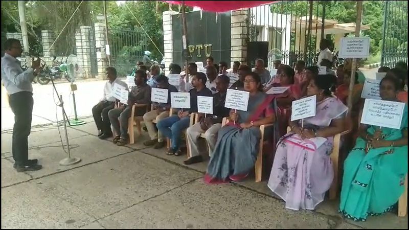 professors and staffs protest against university registrar in pondicherry