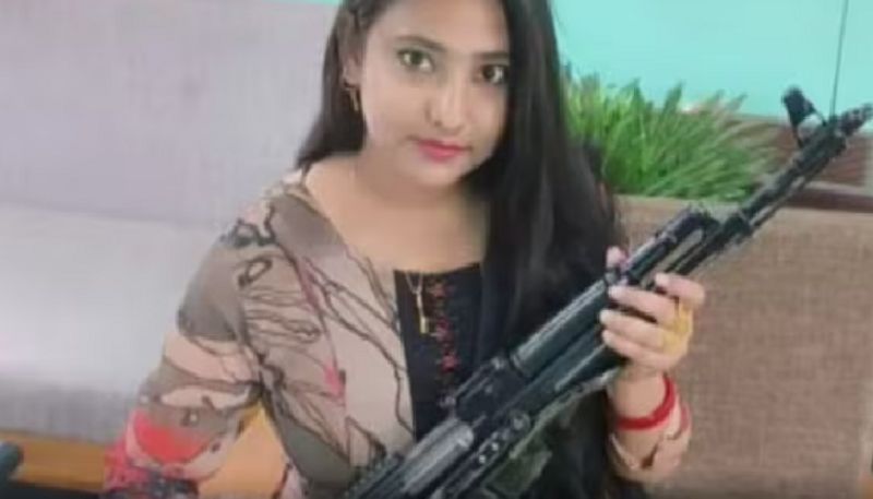 Ex Trinamool leader Riazul Haques wife seen posing with AK-47 gifted by husband Vin