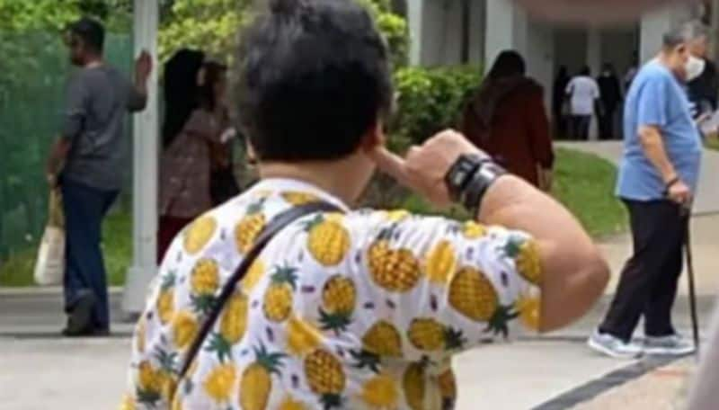 Singapore President Election Women with pineapple shirt not allowed to vote ans