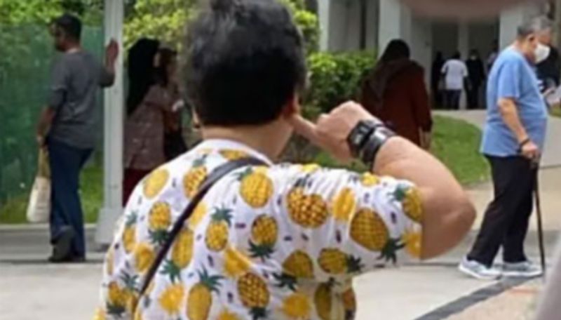 Singapore President Election Women with pineapple shirt not allowed to vote ans