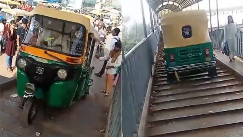 Auto Driver Rides On Foot Over Bridge To Escape Traffic In Delhi, Arrested: video goes viral- rag