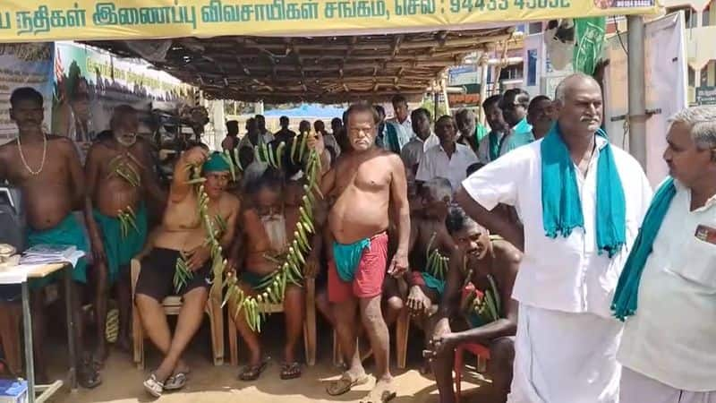 Farmers protest at Trichy Throwing lady finger at Annadurai statue creates tension vel