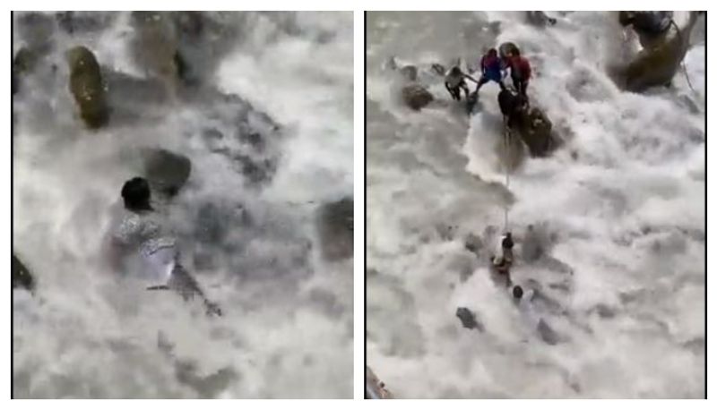 pilgrim slips into river while taking selfie from bridge, rescued-Video