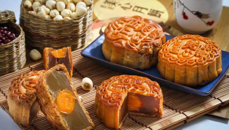 Singapore moon cake scam hackers took more than 200000 Singapore dollars from many accounts ans