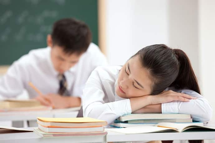 children sleeping at school