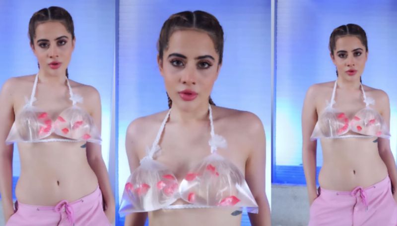 Uorfi Javed In Aquarium Bralette With Fish Swimming in it azn