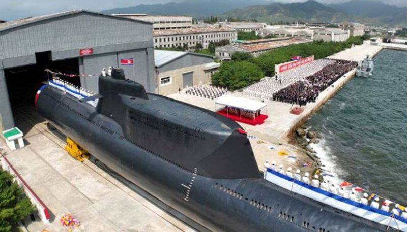 North Korean leader Kim Jong Un launches nuclear attack submarine etj