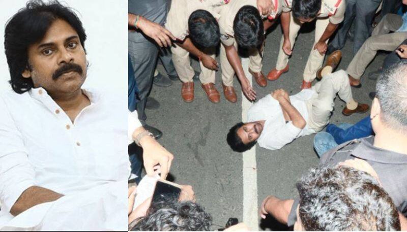 pawan kalyan lies down on road after being stopped at andhra border detained ash