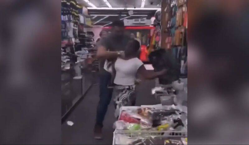 Shocking London shopkeeper grabs woman by throat after altercation; controversial video goes viral - WATCH