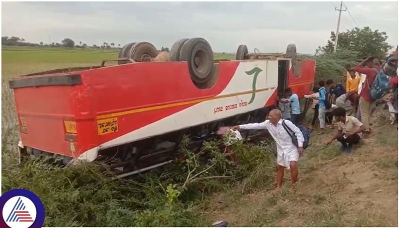 Ballari KSRTC red bus fell on paddy field with its four wheels lifted sat