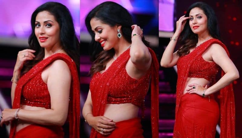 Sadha looks beautiful in red saree NSK