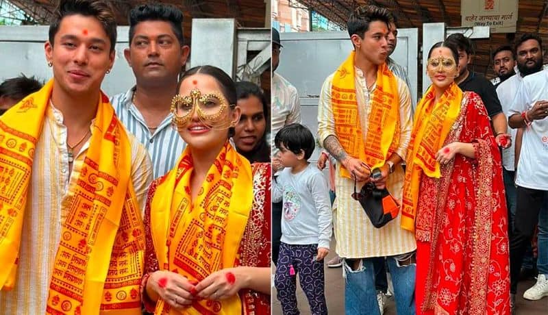 Model fashion Icon Urfi Javed and Pratik Sehajpal visits Siddhivinayak Temple in Mumbai photos goes viral akb