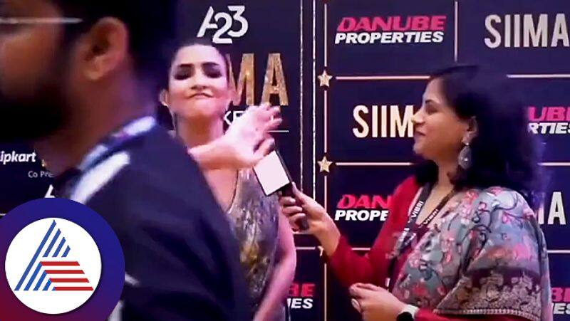 Lakshmi Manchu hits a man for blocking her interview at SIIMA 2023 suc