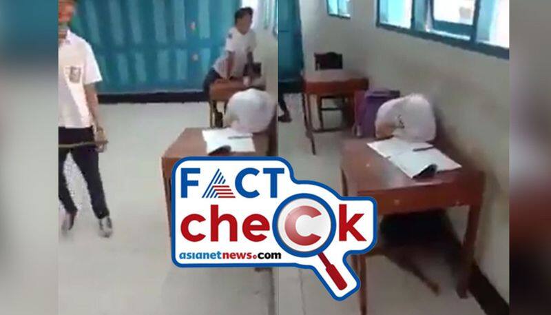 Student in hijab heckled hitting and bullying by male students video goes viral but not from India Fact Check jje 