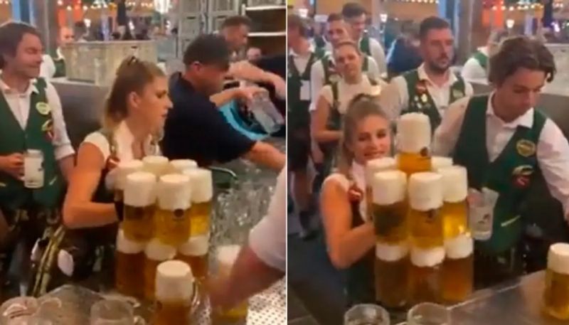 waitress carries 13 beer mugs at a time going viral hyp