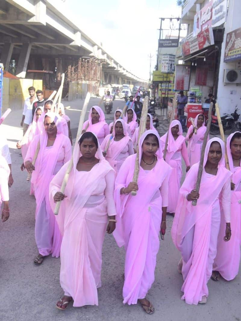 woman with pink saree are roaming in lucknow for women protection ZKAMN