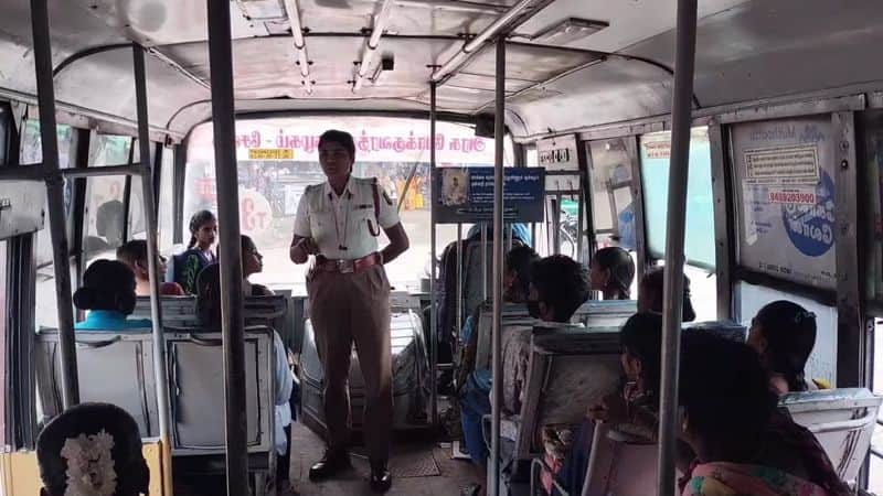 a lady sub inspector make a awareness to college students at government bus in tirupattur district vel