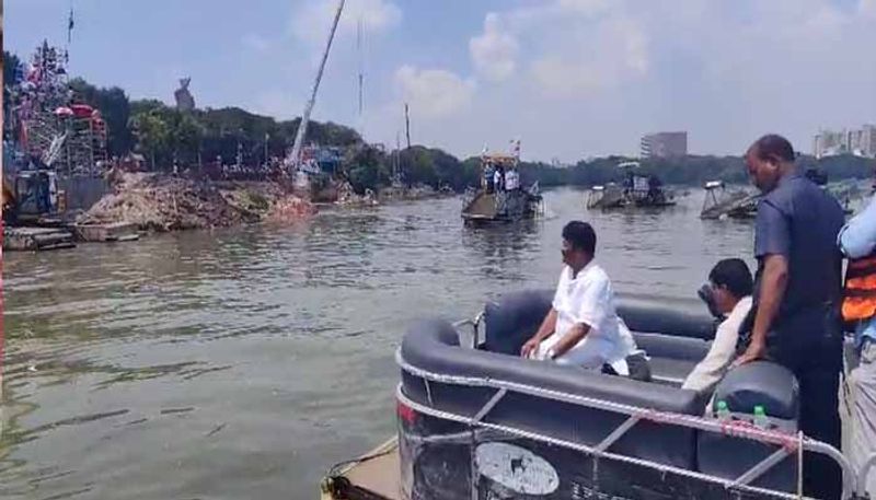 Minister Talasani Srinivas Yadav inspects Ganesh idol immersion at hussain sagar in Hyderabad lns