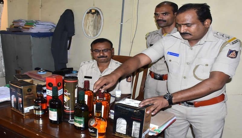 Three Arrested For Transport of Alcohol Bottles in Private Bus in Kalaburagi grg