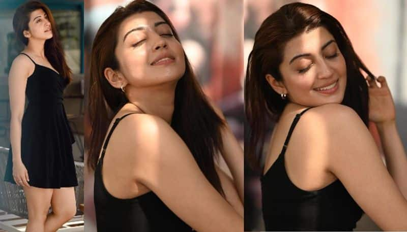 Pranitha Subhash mind blowing photoshoot in black mini gown NSK