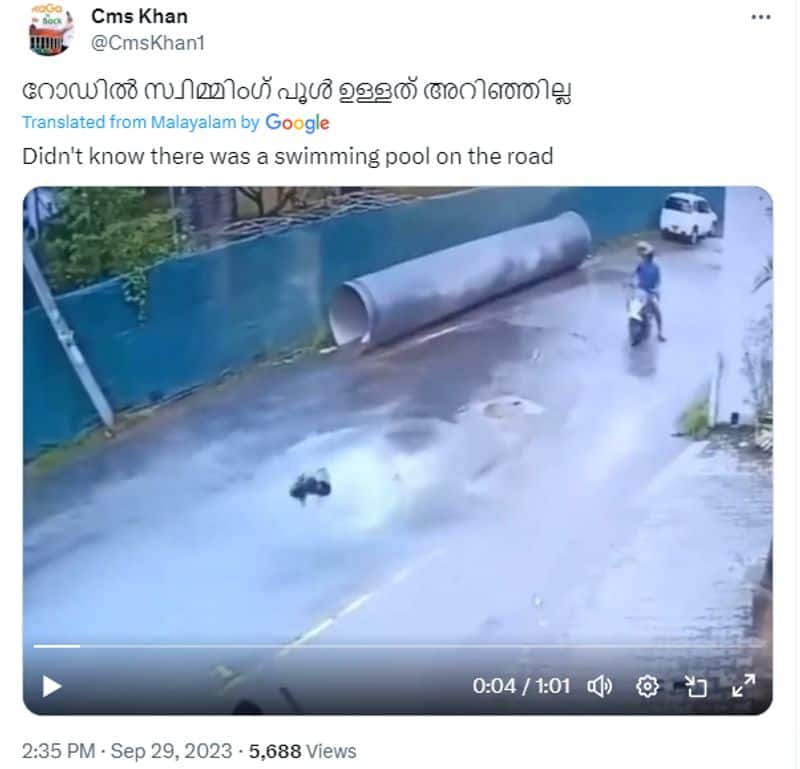 father and daughter got injured after bike slipped into manhole but video is not from kerala fact check jje