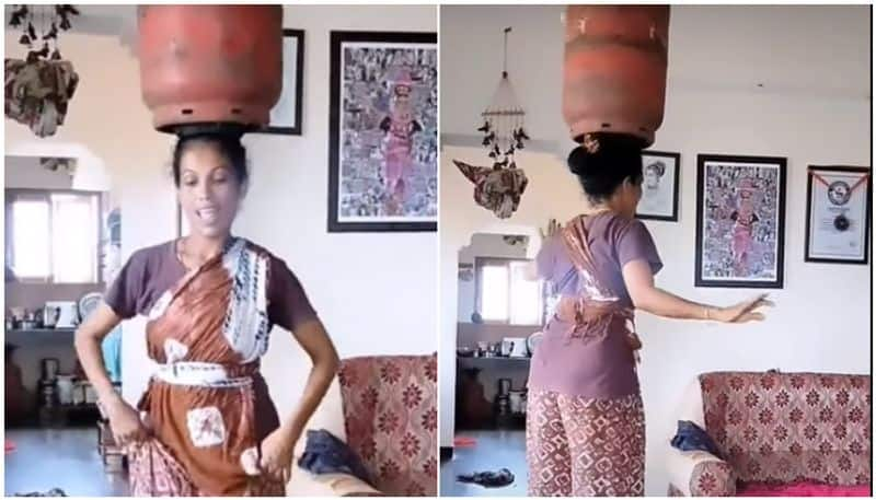 Woman dances with gas cylinder on her head and more watch viral video btb