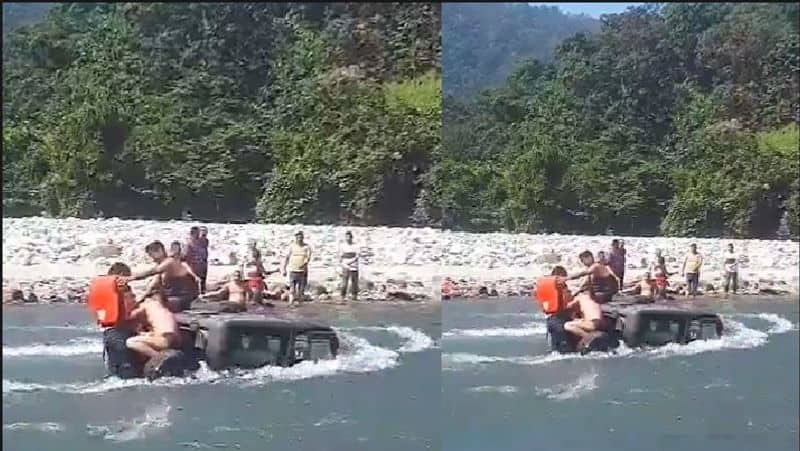 Three young men attempting to cross the heavy flowing  River with SUV Thar vehicle, what happened next was captured in cam akb