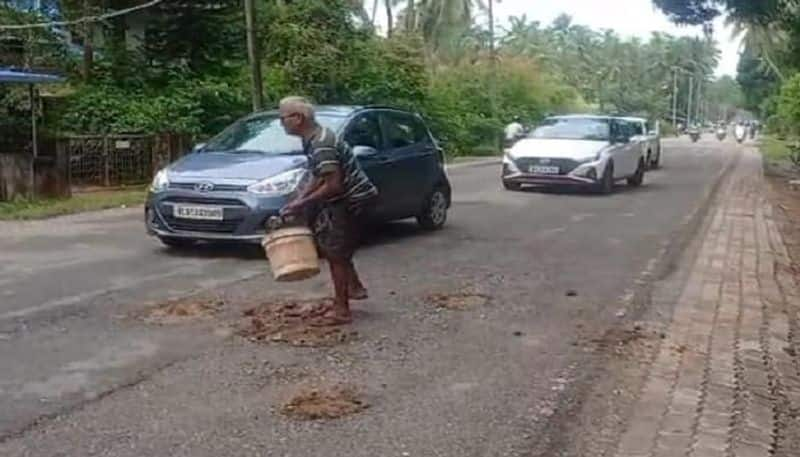 Old Man who Covers Road Potholes at Karwar in Uttara Kananda grg