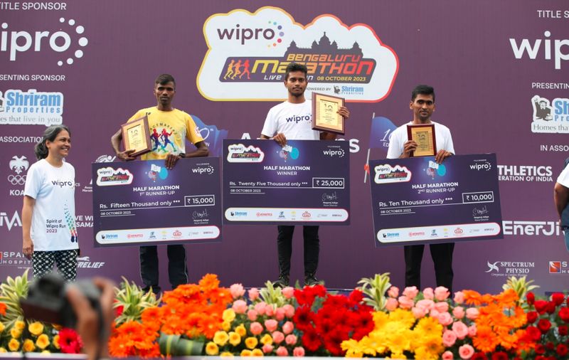 Anish thapa Jyothi wins wipro bengaluru marathon city run championship ckm