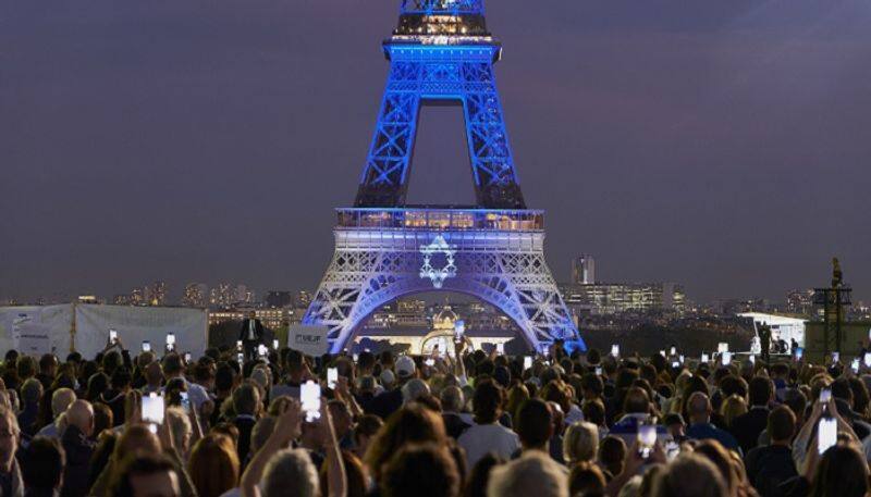 Eiffel Tower in Paris lit up in blue to show France's solidarity with Israel amid Hamas attack Watch AJR