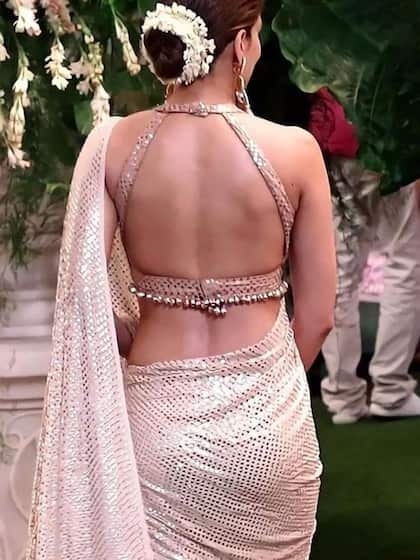 <p> ये ब्लाउज़ सिंपल साड़ी  के साथ खूब जंचेगा वैसे ये लुक नेट की साड़ी के साथ भी शानदार लगता है </p>

