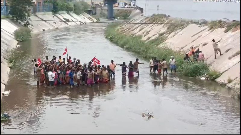 cleaning workers in Salem went down to the river to protest various demands vel