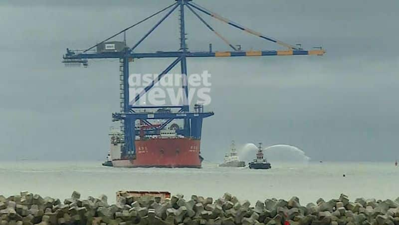 Shen Hua 15 first ship carrying crane to Vizhinjam International Sea Port reception with water salute dee