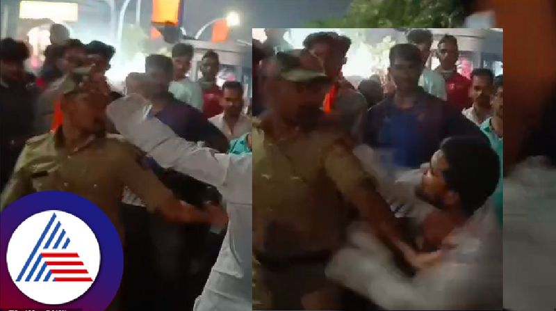 A drunken man assaulted an onduty policeman at davanagere pb road yesterday video viral rav