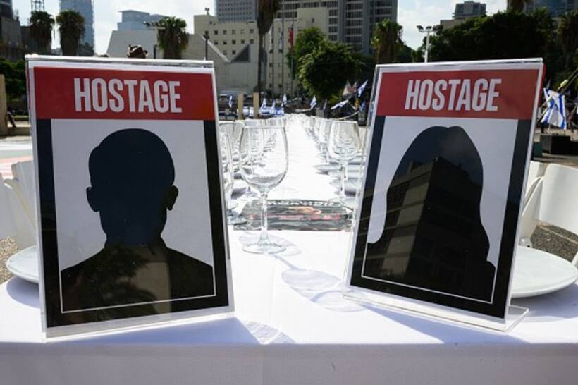 Over 200 empty chairs: Israelis set up symbolic Shabbat Dinner tables for hostages held by Hamas (WATCH)
