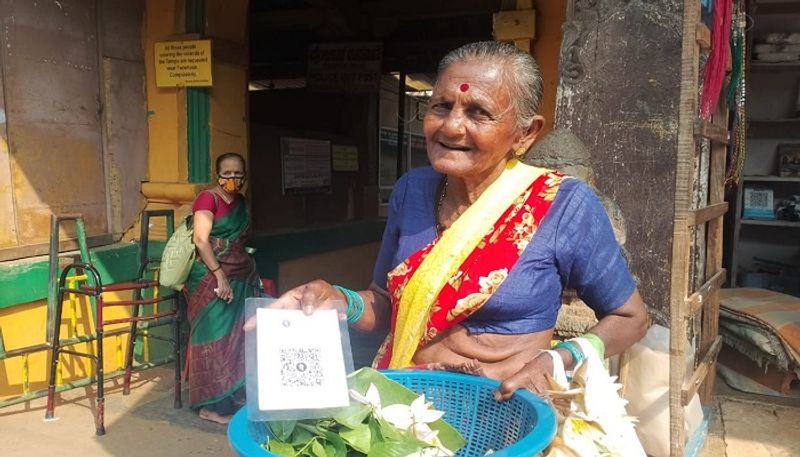 Flowers Seller Old Age Woman Have Phonepay at Gokarna in Uttara Kannada grg