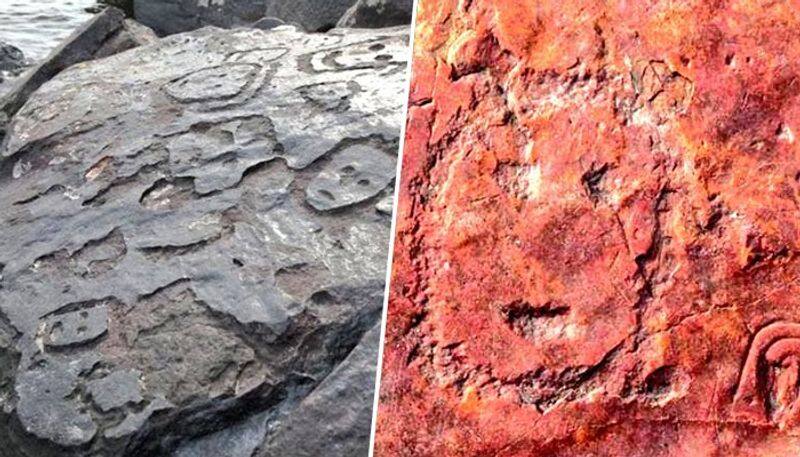 Look like emojis Amazon river drought reveals 2,000-year-old human faces carved in stone (WATCH) snt