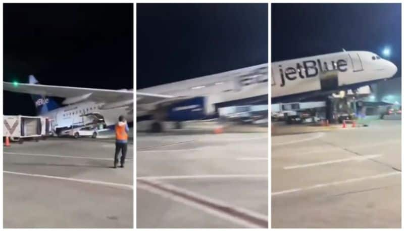 Viral video of the plane s rear end sticking up as the passengers begin to disembark bkg