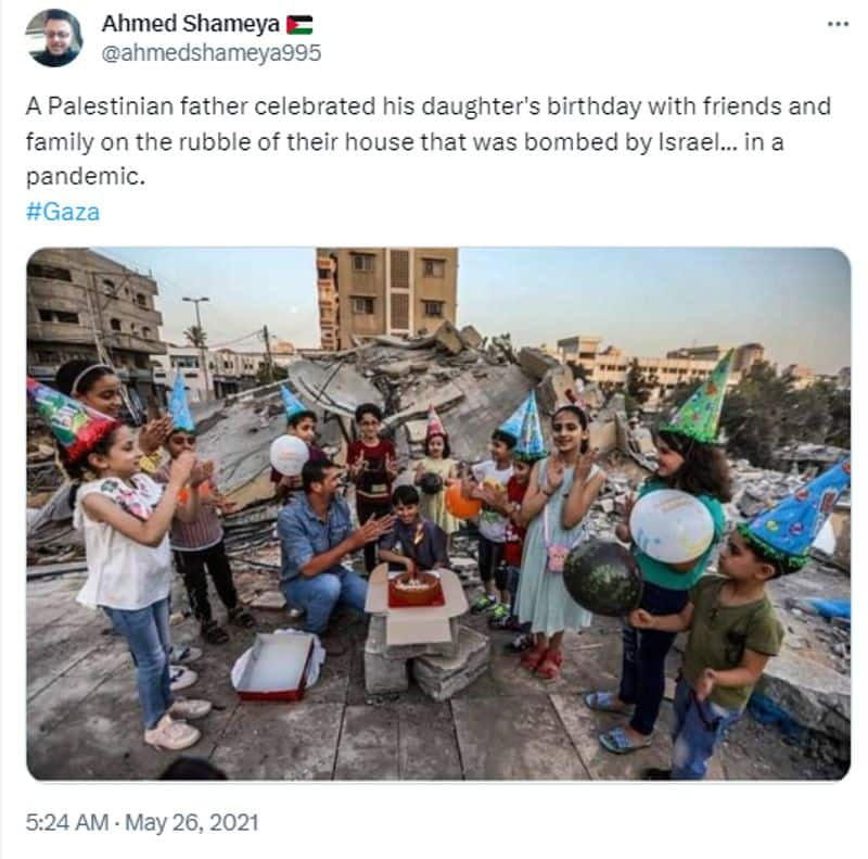 photo of boy celebrating birthday in Gaza near his destroyed house is old jje 